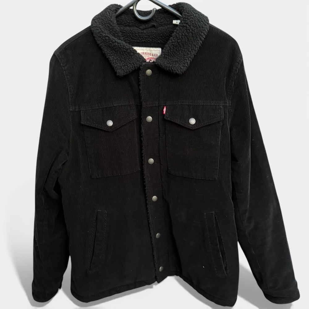 Western / Trucker energy
Levi’s Black Sherpa-Lined Corduroy Trucker Jacket – M